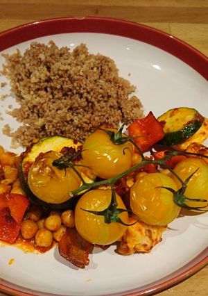 A picture of Roasted Harrissa veggies with halloumi and chickpeas.