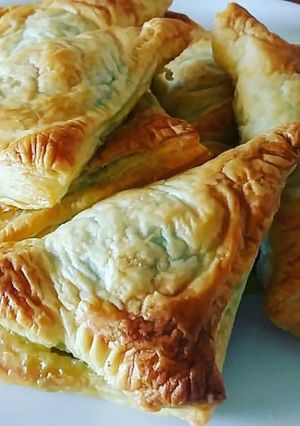 Foto di Triangoli di sfoglia con spinaci e Fontal