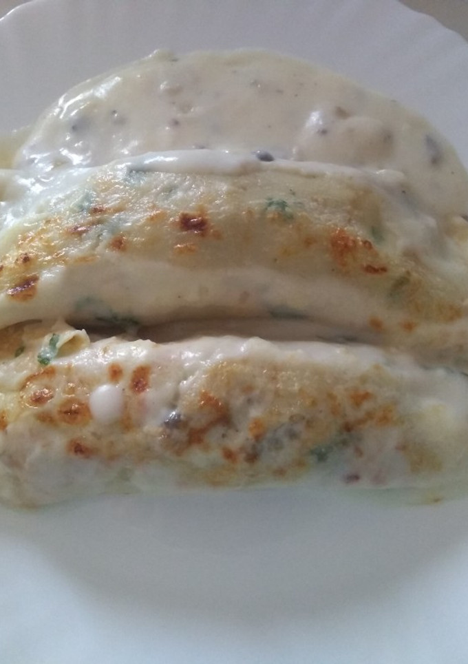 Una foto de Crepes con bechamel rellenas de pollo y champiñón
