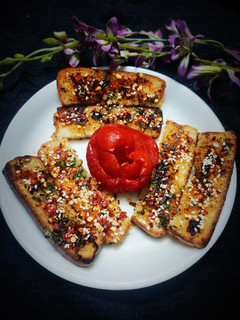 A picture of Spicy Bread Garlic Sticks.