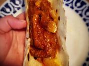 Una foto de tortillas de trigo rellena