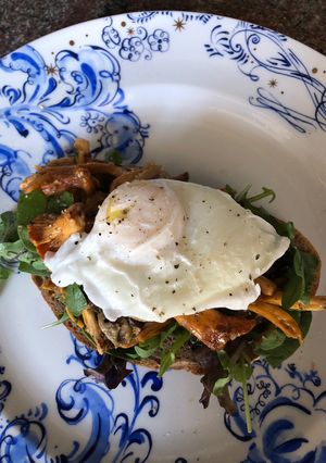 A picture of Mushrooms and poached egg (vegetarian).
