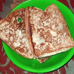 A picture of Fried bread with egg.