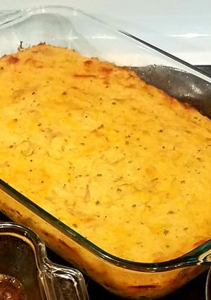 A picture of Seasoned and cheesy smashed potatoes.