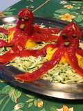Pieuvres de poivrons grillés île de betteraves et mer de courgette