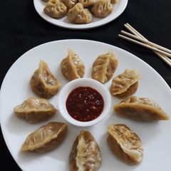 A picture of Veg-Paneer Stuffed Momos.