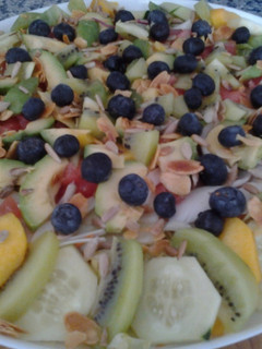 Una foto de Ensalada con frutas y frutos secos