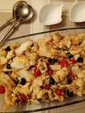 Insalata calda di baccalà pomodorini olive nere capperi