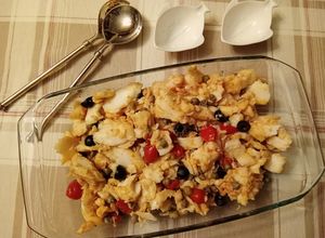Foto di Insalata calda di baccalà pomodorini olive nere capperi