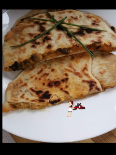 A picture of Cheesy Mushroom Paratha.