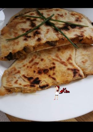 A picture of Cheesy Mushroom Paratha.
