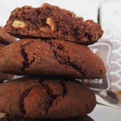 A picture of Cocoa tahini cookies with roasted almonds.