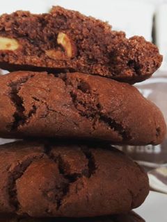 A picture of Cocoa tahini cookies with roasted almonds.