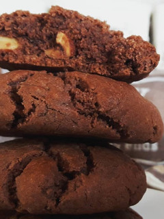 A picture of Cocoa tahini cookies with roasted almonds.