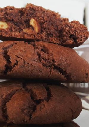 A picture of Cocoa tahini cookies with roasted almonds.