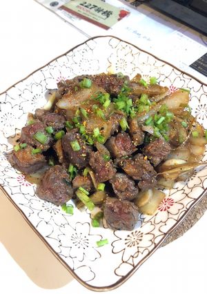 A picture of Beef short ribs with Imari sauce.
