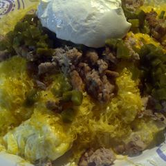 A picture of Breakfast fish nachos.