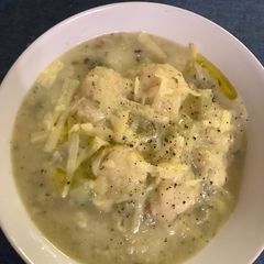 A picture of Cheesy Cauliflower Soup with Semolina Balls.
