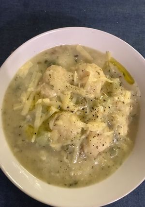 A picture of Cheesy Cauliflower Soup with Semolina Balls.