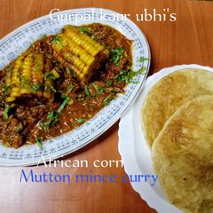 A picture of African Corn & Mutton mince curry 🍅🧅🧄🌿🌶.