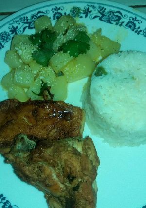 A picture of Potatoes in Butter with White Rice and Teriyaki Chicken.