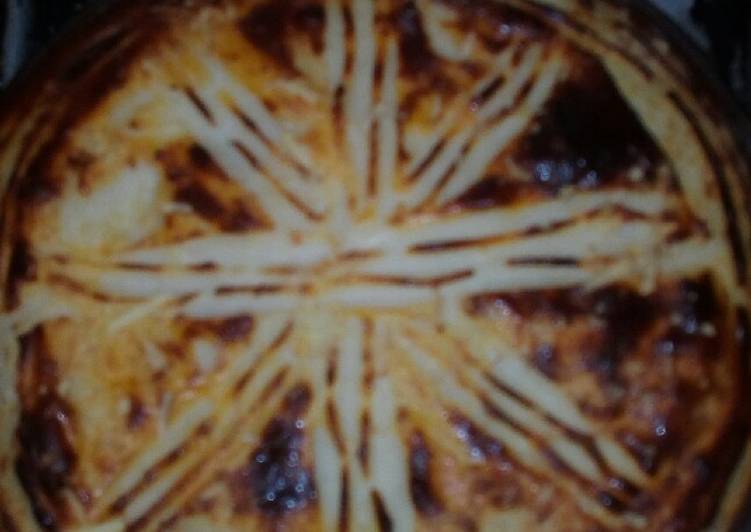 Pastel de papas relleno de jamón, queso, y huevo