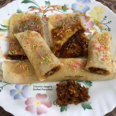 A picture of Coconut Jaggery Stuffed Pancakes.