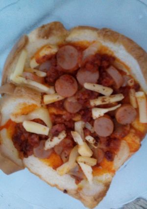 Foto resep Pizza dimasak pake magic com ala anak kos