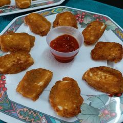 A picture of Schezwan Paneer Fingers.