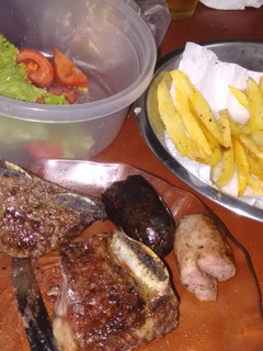 Una foto de Asado con papas