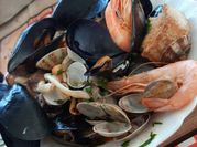 Una foto di zuppa di cozze
