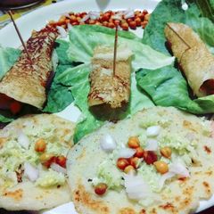 Semolina chilla with sprouts A picture of Semolina chilla with sprouts.