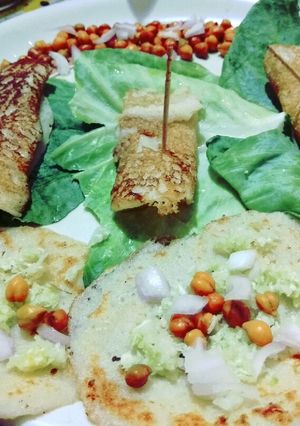 A picture of Semolina chilla with sprouts.