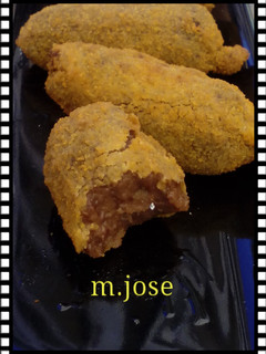 Una foto de Bocaditos de croquetas de morcilla con cebolla