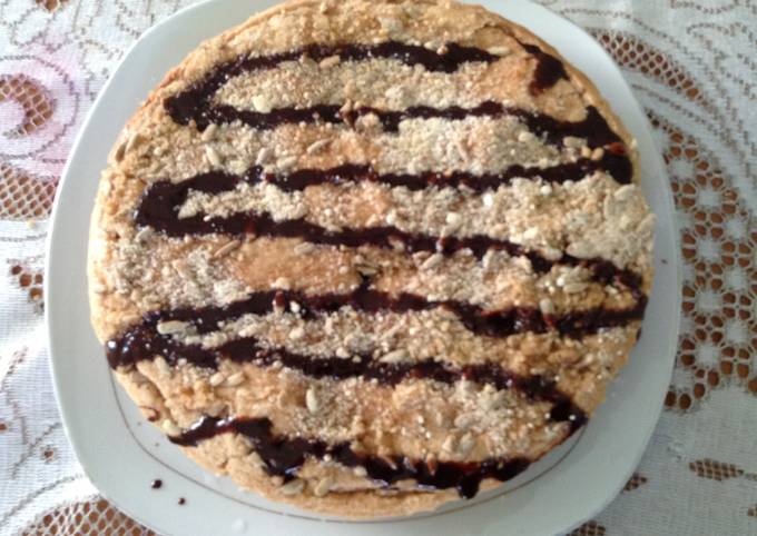 No butter coffee cake with chocolate drizzle and pumpkin seeds recipe main photo