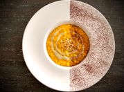 Una foto di risotto gorgonzola e noci