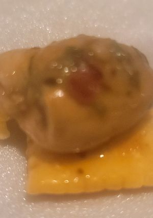 A picture of Sweet Soy Spiced Oyster on White Cheddar Cracker.