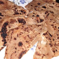 A picture of Cheesy pizza sauce paratha.