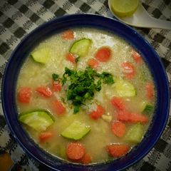A picture of Rice Chicken vegetable soup.