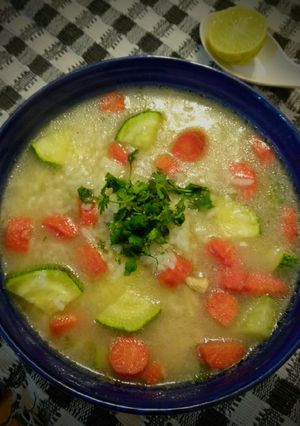 A picture of Rice Chicken vegetable soup.