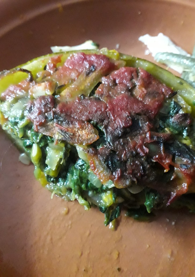 Una foto de Zapallitos rellenos de espinaca