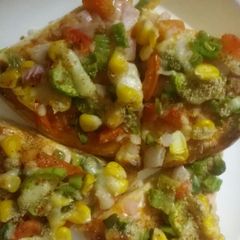 Veg Corn Piza A picture of Veg Corn Piza.