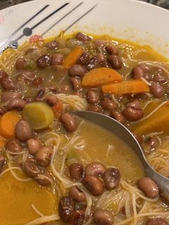 Una foto de Caldo de porotos