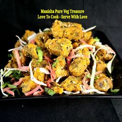 A picture of Cabaage Carrot Palak Seasame Muthiya.
