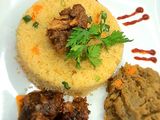 Buttered couscous and onion sauce