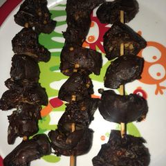 A picture of Grilled kidneys.