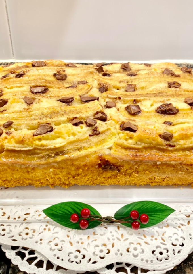 Una foto de Pastel de plátano y chocolate con leche