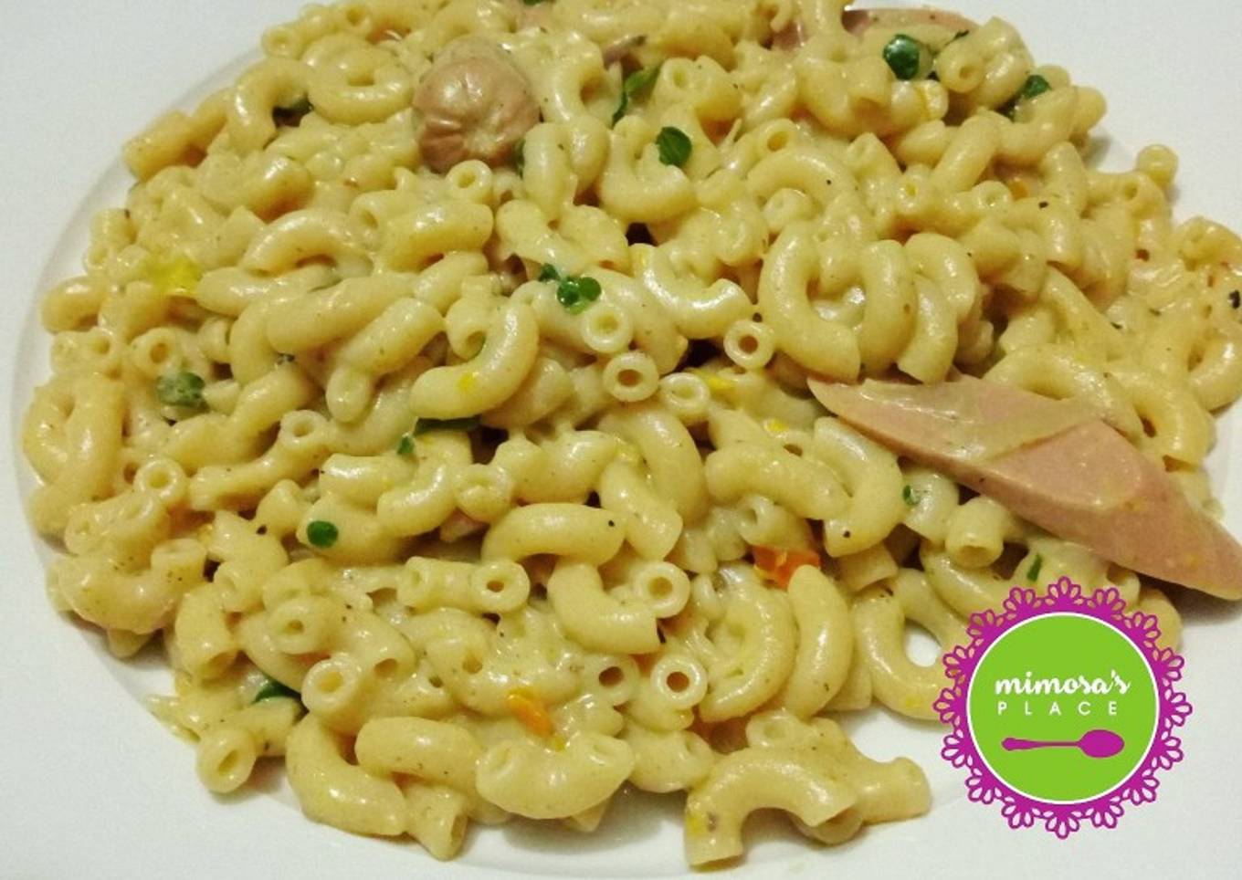 Creamy and delicious pasta Alfredo with mini hot dogs