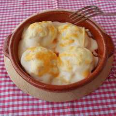 Una foto de Huevos rellenos gratinados