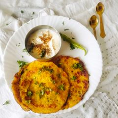 A picture of Leftover Poha Chilla with fresh Veggies.